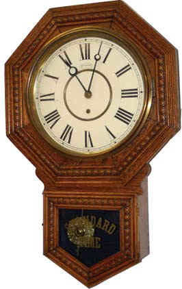 E. Ingraham Co. solid oak clock, the "Lyric", ca 1911. — Antique Clocks Price Guide