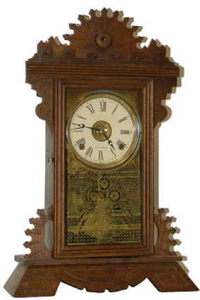 We don't know who made this parlor clock, but it was made for the Portuguese market. — Antique Clocks Price Guide