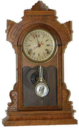 Waterbury Clock Co. walnut parlor-calendar clock "Andover", ca 1886. — Antique Clocks Price Guide