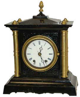 "Seth Thomas Sons &amp; Co. Thomaston, CT", 8 day movement in an enameled iron case with 4 gold painted columns. — Antique Clocks Price Guide