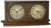 Two clocks, I would guess for chess or something similar. — Antique Clocks Price Guide