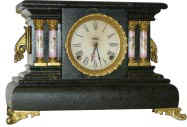Seth Thomas wood case with adamantine finish, gilt metal trimmings and very special assorted designs on the adamantine columns. — Antique Clocks Price Guide