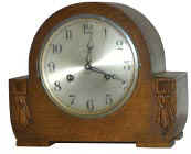 English oak mantle, 8 day time and strike. — Antique Clocks Price Guide
