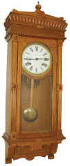 Contemporary oak wall clock, made in Korea. — Antique Clocks Price Guide
