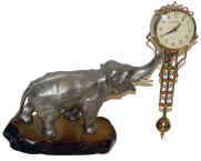 Elephant - Swinging Arm clock, made in Japan. — Antique Clocks Price Guide