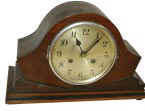 English tambour, 8 day half hour strike on a gong. — Antique Clocks Price Guide