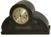 German tambour, a very fancy case with carvings, rounded style, large glass opening to view the pendulum swinging. — Antique Clocks Price Guide
