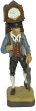 Cuckoo clock salesman, molded of some hard material, pieces glued together, painted. — Antique Clocks Price Guide