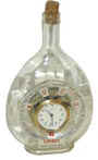 Wine bottle with small clock in the center. Dial signed, "Kaiser, Made in Germany". — Antique Clocks Price Guide
