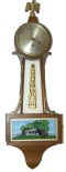 New Haven banjo, "Windrow", ca 1913. 24 inch solid mahogany case with cast metal side ornaments, eagle, and sash. — Antique Clocks Price Guide
