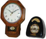 Two clocks. United Electric, small wood case is 11 inches long. — Antique Clocks Price Guide