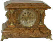 Seth Thomas light brown adamantine mantle clock. I am not sure which model, but may be the "Eton", ca 1904. — Antique Clocks Price Guide