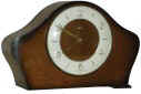 "Smiths Clocks and Watches, Made in Great Britain", small shelf clock, 8 day balance wheel movement, strikes a cathedral gong. — Antique Clocks Price Guide