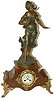 Large French statue clock, blood red marble base with four large feet.