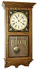 Emperior contemporary wall clock, oak case is 29.5 inches high.