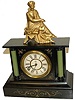 Waterbury Clock Co. enameled iron case clock with figure, "Palmetto", ca 1891.