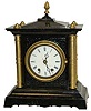 "Seth Thomas Sons & Co. Thomaston, CT", 8 day movement in an enameled iron case with 4 gold painted columns.