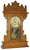Wm. L. Gilbert Clock Co. kitchen clock, "Bass", one of the clocks in their "Fish Sets", ca 1891.