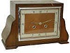 English shelf clock, 8 day, half hour gong strike, and is running.
