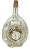 Wine bottle with small clock in the center. Dial signed, "Kaiser, Made in Germany".