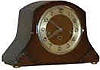 English mantle clock, plays Westminster chimes on 5 rods each quarter hour, strikes the hours.