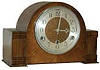 This English oak clock has more eye appeal than the previous.