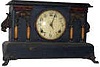 Wm. L. Gilbert Clock Co. enameled black mantle. 