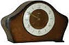 "Smiths Clocks and Watches, Made in Great Britain", small shelf clock, 8 day balance wheel movement, strikes a cathedral gong.