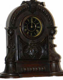 Mueller and Kroeber, ca 1868. Good label inside the case says, "Fuller and Kroeber, manufacturers of American Clocks, — Antique Clocks Price Guide