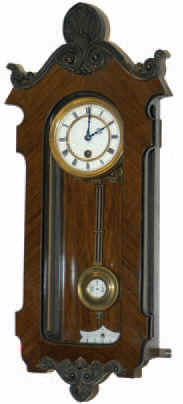 Lenzkirch miniature 8 day spring driven wall regulator. The trapezoid shaped, solid plate movement is signed by the maker and has the serial number 303741, on the movement and the back of the dial plate. — Antique Clocks Price Guide