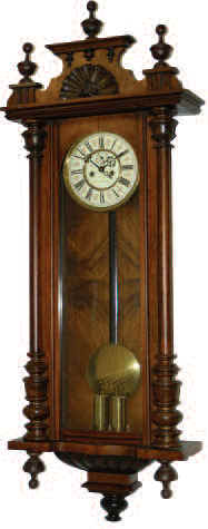 Large Vienna 2 weight regulator, in a walnut veneered case that is 50 inches tall, and a tad under 19 inches wide. — Antique Clocks Price Guide