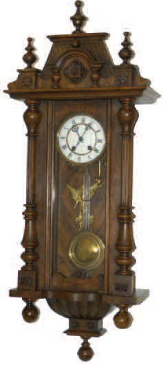 German RA with some unusual features. The 8-day movement's trademark indicates it was made by the Carl Werner Uhrenfabrik (clockfactory) but it also is marked that the movement was a prototype made by Herman Brankmann. — Antique Clocks Price Guide