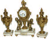 French three piece clock and urn set, brass and marble. As is the case many times, the French used both brass-bronze and spelter on the same clock, depending on the castings needed for a particular piece. — Antique Clocks Price Guide
