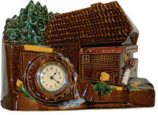 The Lux Clock Mfg Co. porcelain cased clock, "Mill". — Antique Clocks Price Guide