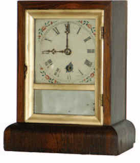 William L. Gilbert and Co. miniature cottage clock. — Antique Clocks Price Guide