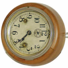 Seth Thomas hanging "Wood Lever", ca 1924, or it could be a relative of any number of Lever, Chronometer, or Ships Bell clocks. — Antique Clocks Price Guide