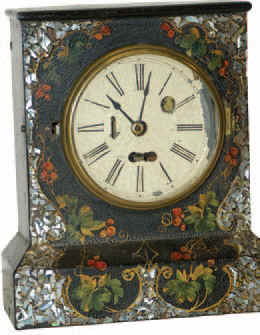 Terryville Clock Co., Terryville, Conn. Unlabeled cast iron cottage style clock with outstanding MOP and multicolored inlay and decoration. — Antique Clocks Price Guide