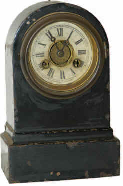 The Terry Clock Co. Waterbury, Conn. black iron clock, 8 inches tall. — Antique Clocks Price Guide