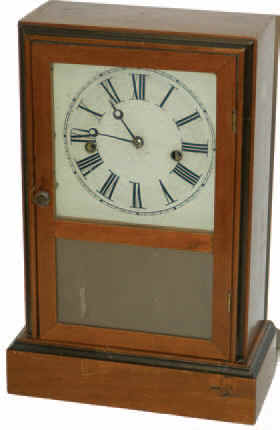 "Eistell Programmable Clock", made by "U.S.C. and B. Co. Chicago", so the label reads, which stands for United States Clock and Brass Company, ca 1865-1866. — Antique Clocks Price Guide