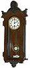 Lenzkirch miniature 8 day spring driven wall regulator. The trapezoid shaped, solid plate movement is signed by the maker and has the serial number 303741, on the movement and the back of the dial plate.