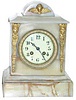 French shelf clock, ca 1890. 11.5 inches tall white onyx case with applied brass Egyptian figures.