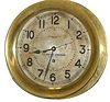 Chelsea Clock Co., Boston n U.S. Maritime Commission, Serial No. 9388, signed on the silver dial of this brass cased clock.