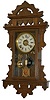 E. N. Welch Mfg. Co. walnut hanging parlor clock, manufactured for the Metropolitan Mfg. Co. possibly to be awarded as prizes or given with the purchase of merchandise.