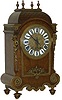 French dome top bracket clock, with an unusual fish scale roof, almost a "Widows Walk" on the flat top, and an abundance of attractive brass trim.