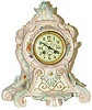 French porcelain clock decorated as only they could.