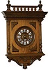 French hanging balcony clock in a 26.5 inches tall walnut case with full turned and fluted columns that have nice turned capitals and bases.