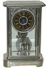Ansonia Clock Company crystal regulator, "Symbol", ca 1880. An early crystal regulator style, larger than those that followed, and is made of nickel-plated metal rather than the more common gold plated.