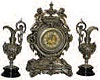 Ansonia Clock Company, metal case n mantle clock, "Lydia with Louis XVI Pitchers", ca 1894 and 1904. The set was cleaned and polished by Bruce Baziluk.