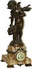 French "Doctor Love" statue, on a marble clock base. Doctor Love is a Cupid-Angel, carrying a doctors bag in his hand and has bow and arrows on his back.