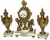 French three piece clock and urn set, brass and marble. As is the case many times, the French used both brass-bronze and spelter on the same clock, depending on the castings needed for a particular piece.